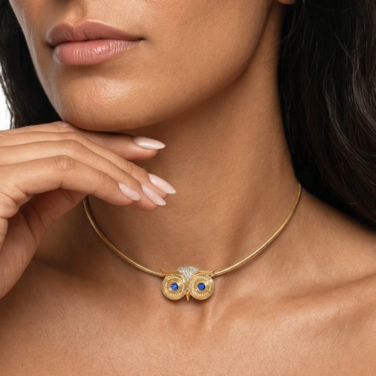 Athena Necklace in 14k yellow gold with blue sapphire eyes by SELIN KENT, worn on model