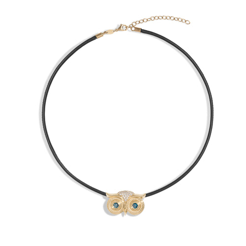 Athena Necklace in 14k yellow gold and a leather cord with blue diamond eyes by SELIN KENT 